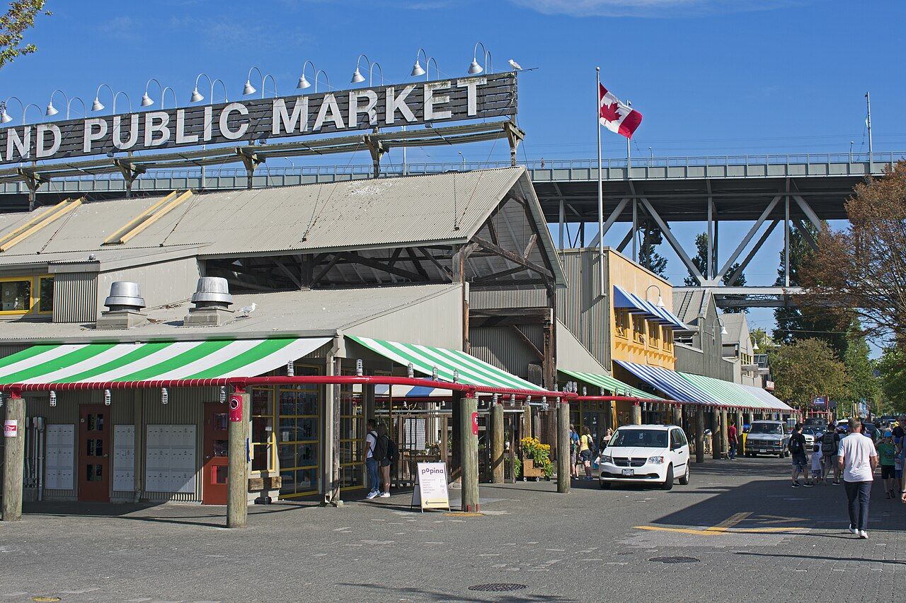 Granville Island Public Market with the Granville Street bridge behind